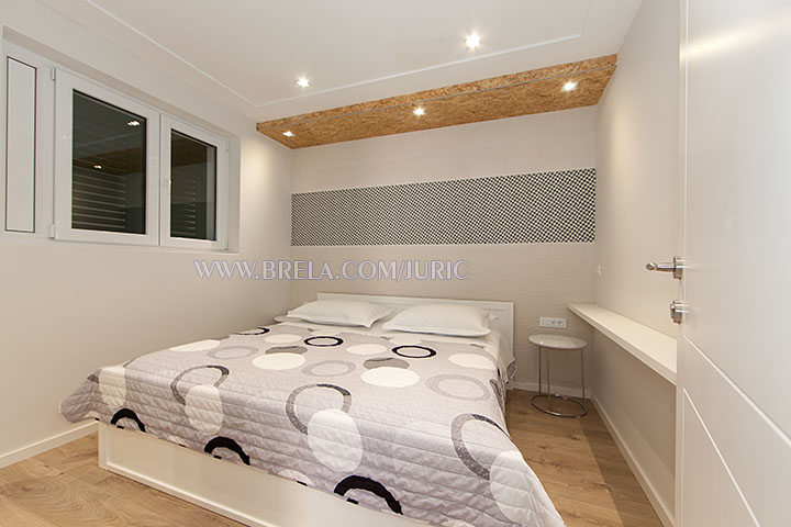 Apartments Juri, Brela Soline - bedroom with LED lighting