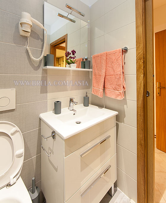 Apartments Lasta, Brela - bathroom sink and mirror
