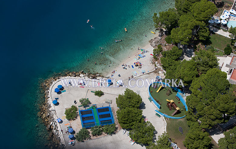 Beach in front of hotel Soline Brela, beach, children playground