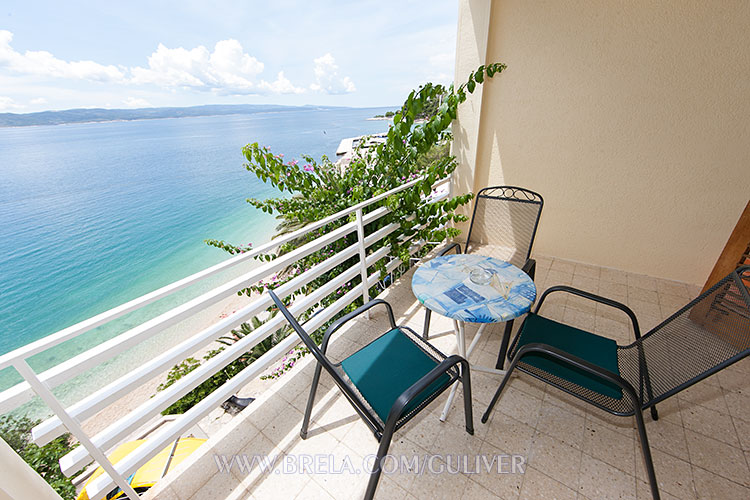 balcony with view on beach and adriatic sea