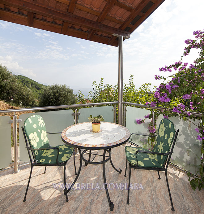 balcony in flowers, view on Biokovo and Adriatic sea, apartments Lara, Brela Soline