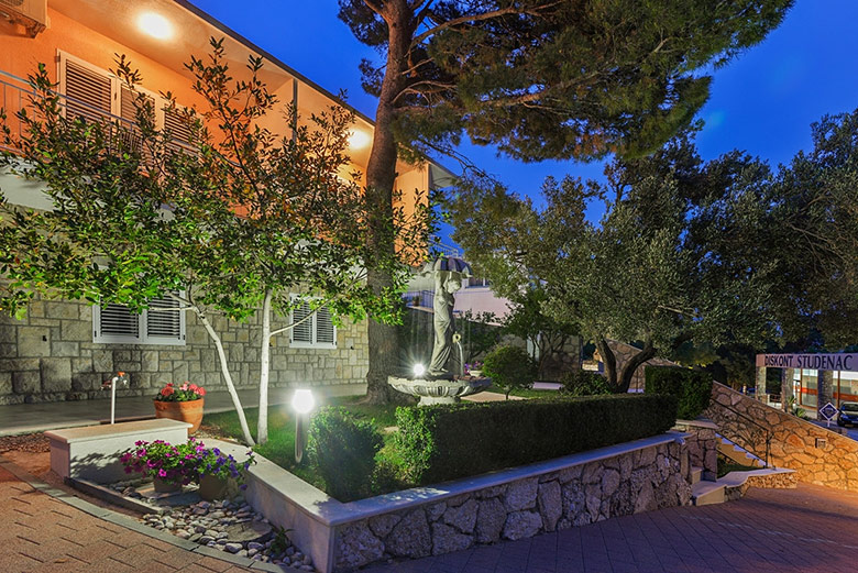 garden with fontana at night